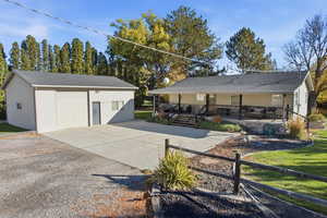 Rambler/Ranch style home with detached garage and office space