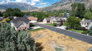 View of mountain background featuring nearby suburban area