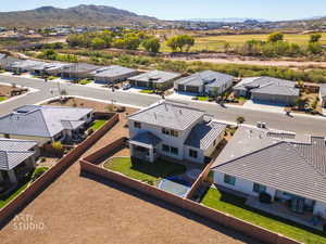 Aerial view of residential area with a mountain backdrop
