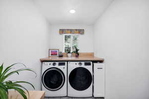 Washroom with separate washer and dryer