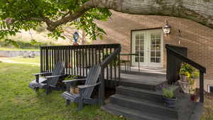 Deck with french doors and a lawn