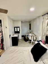 Basement Bedroom 2 with Attached Bath (Toilet works, sink/shower/vanity need finished)