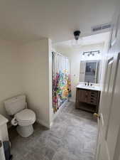Bathroom with vanity and a shower stall
