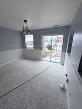 Unfurnished dining area with carpet floors