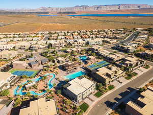 Aerial perspective of suburban area with a water and mountain view