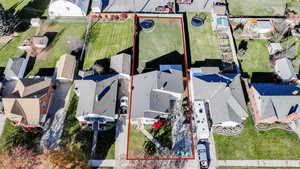 Aerial perspective of suburban area with property boundaries highlighted