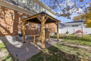View of patio with a gazebo