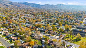 Aerial view of property's location with a mountain backdrop