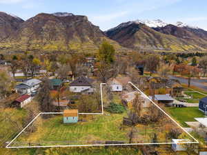 View of mountain background featuring nearby suburban area