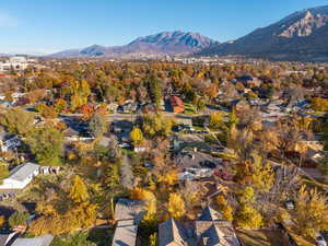 View of property location with a mountainous background and nearby suburban area