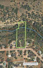 Aerial view of property's location featuring property boundaries highlighted