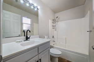 Full bathroom with vanity and bathing tub / shower combination
