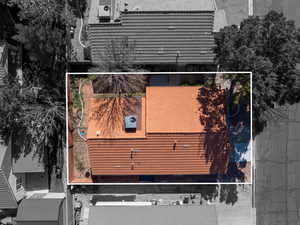 Aerial view of property and surrounding area with property parcel outlined