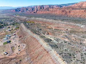 Aerial view of property's location with a mountainous background