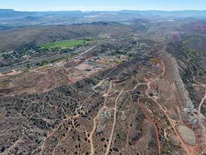 View of property location featuring a mountainous background and rural landscape