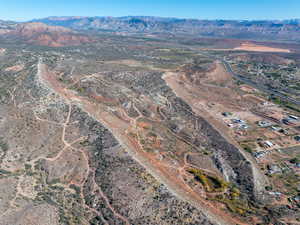Aerial overview of property's location featuring mountains and rural landscape