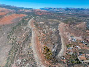 Aerial overview of property's location featuring mountains
