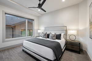 Bedroom with carpet flooring, a ceiling fan, and recessed lighting