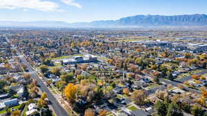 View of property location featuring a mountain backdrop and nearby suburban area