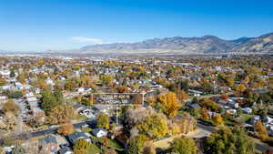 View of property location with a mountain backdrop and nearby suburban area