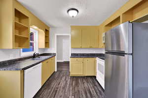 Kitchen with newly painted cabinets.