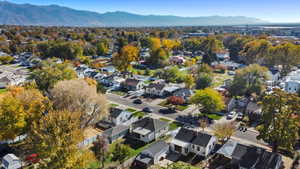 View of property location with a mountain backdrop and nearby suburban area