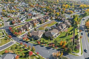 Aerial view of property's location with nearby suburban area