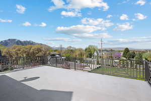 View of patio / terrace with a mountain view