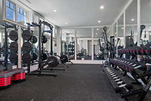 Exercise room featuring recessed lighting