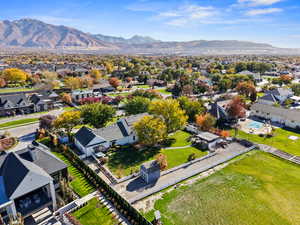 Aerial view of residential area featuring a mountain backdrop
