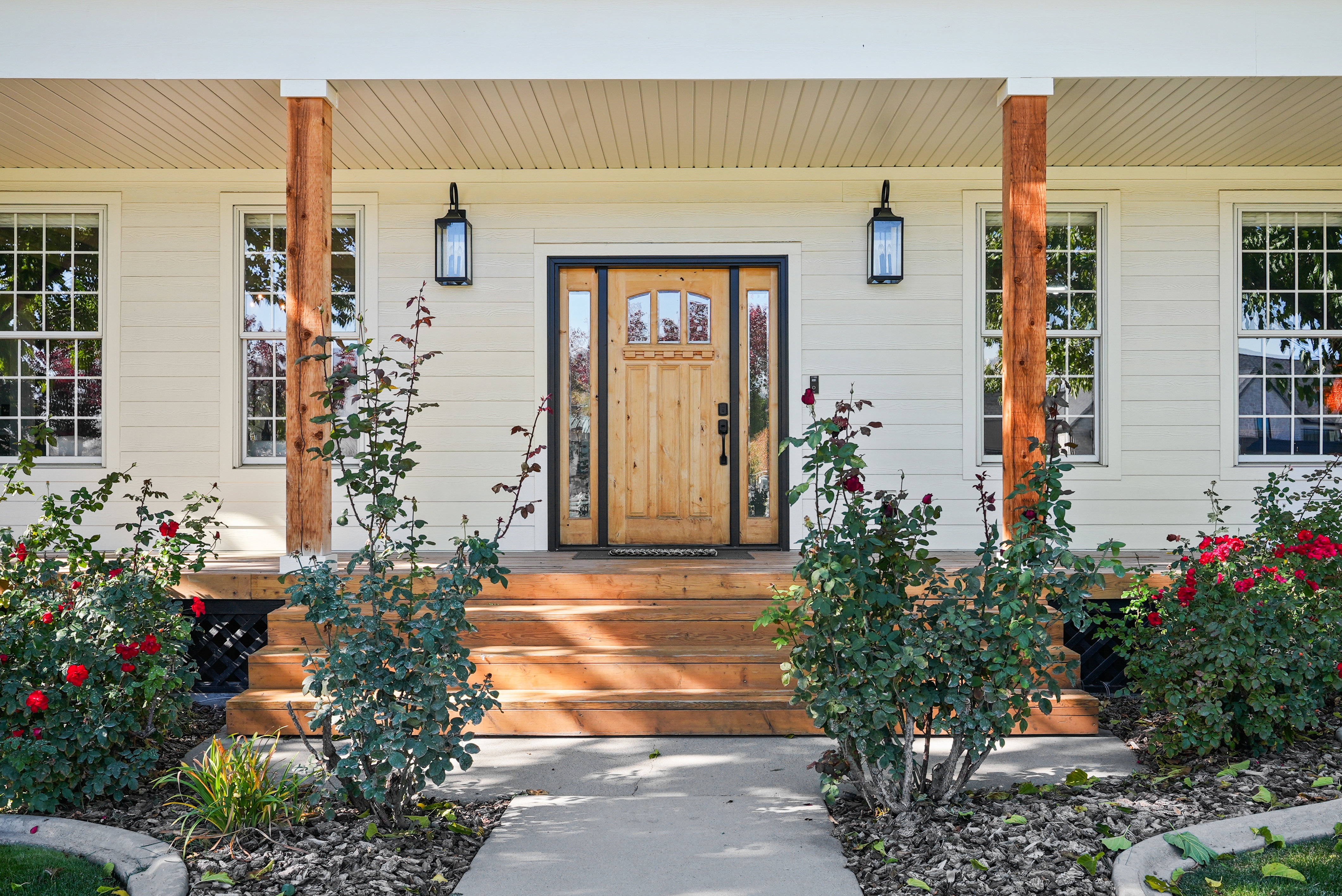 Entrance to property featuring a porch