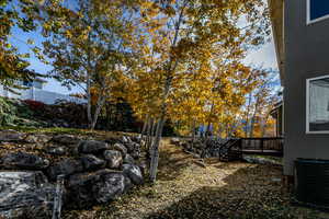 View of yard featuring a deck