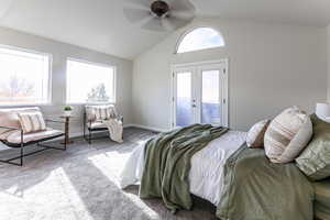 Bedroom with lofted ceiling, carpet flooring, access to outside, french doors, and a ceiling fan