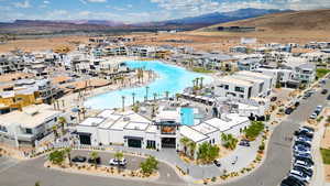 Bird's eye view of a mountainous background and a pool area