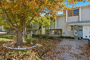 View of front of property with stone siding