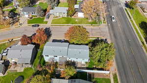 Aerial view of property's location with nearby suburban area