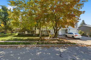 View of front of house featuring driveway and a garage