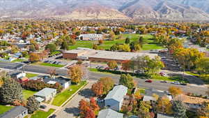 Aerial perspective of suburban area featuring mountains