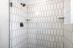 Bathroom with a tile shower