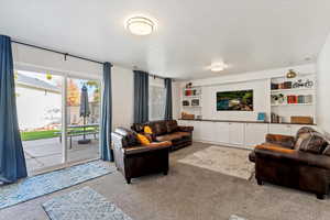 Living room with light carpet