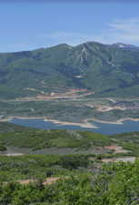 View of mountain background featuring a nearby body of water
