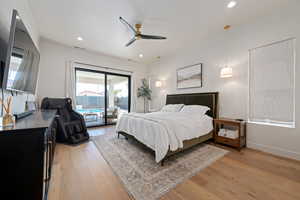 Bedroom featuring light wood-style flooring, access to outside, ceiling fan, recessed lighting, and ornamental molding