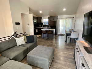 Vaulted ceilings, with lots of natural light coming in. Deck access with doggie door for the pups