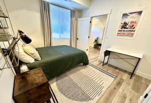Bedroom featuring wood finished floors