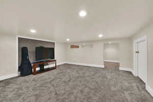 Finished basement featuring carpet and recessed lighting