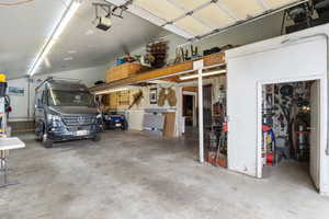 Garage featuring a garage door opener