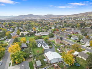 Aerial view of residential area with a mountain backdrop
