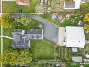 Aerial overview of property's location featuring nearby suburban area