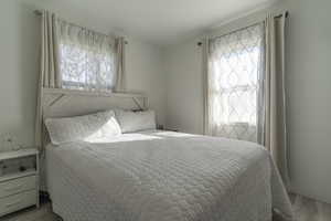 Bedroom with wood finished floors