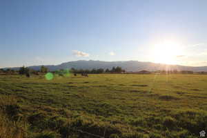 View of mountain background featuring rural landscape and a pastoral area